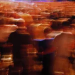 Crowd on a concert moving in the rhythm.